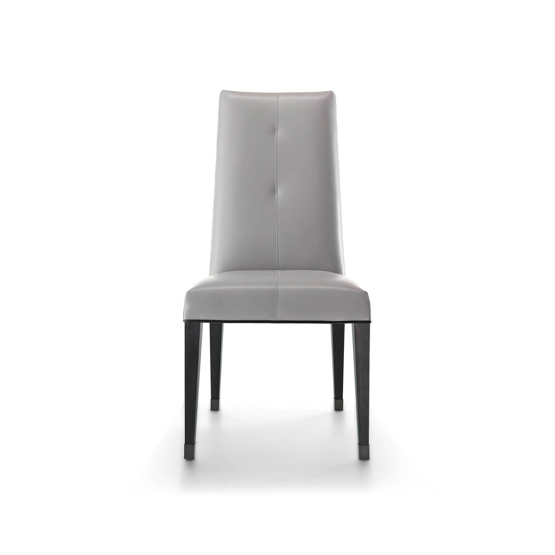 Elegant high back dining chair with gray upholstery and dark wooden legs.
