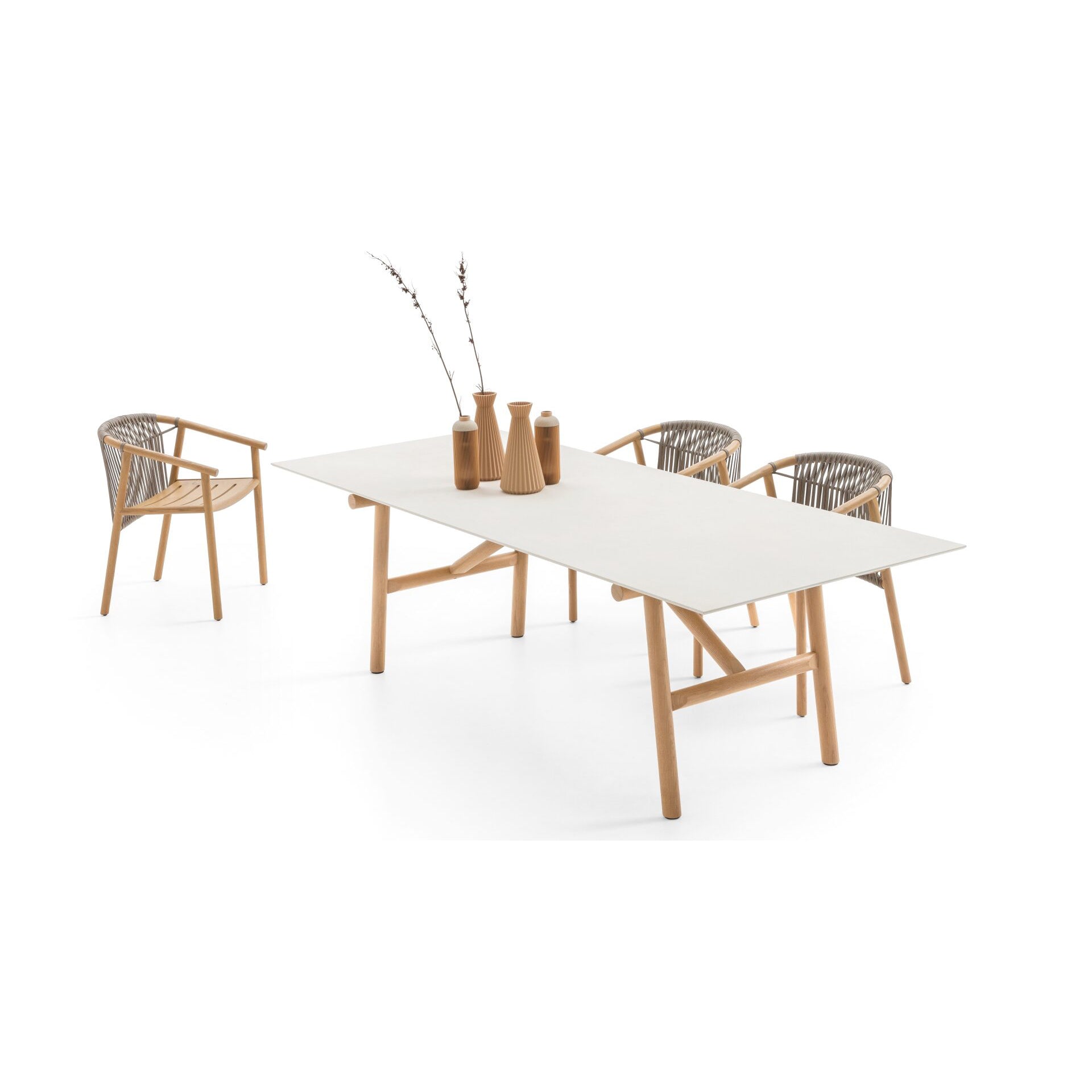 A rectangular outdoor dining table with a white marble top and wooden legs, accompanied by four chairs with a mix of wood and mesh upholstery, set against a white background.