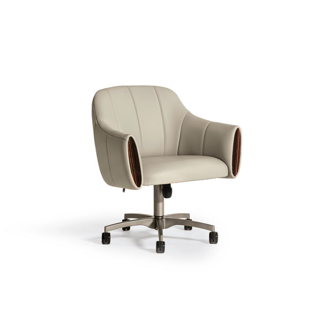 A luxurious office chair with a quilted backrest, embroidered logo, and wooden armrest inserts, finished with a titanium satin base and wheels.