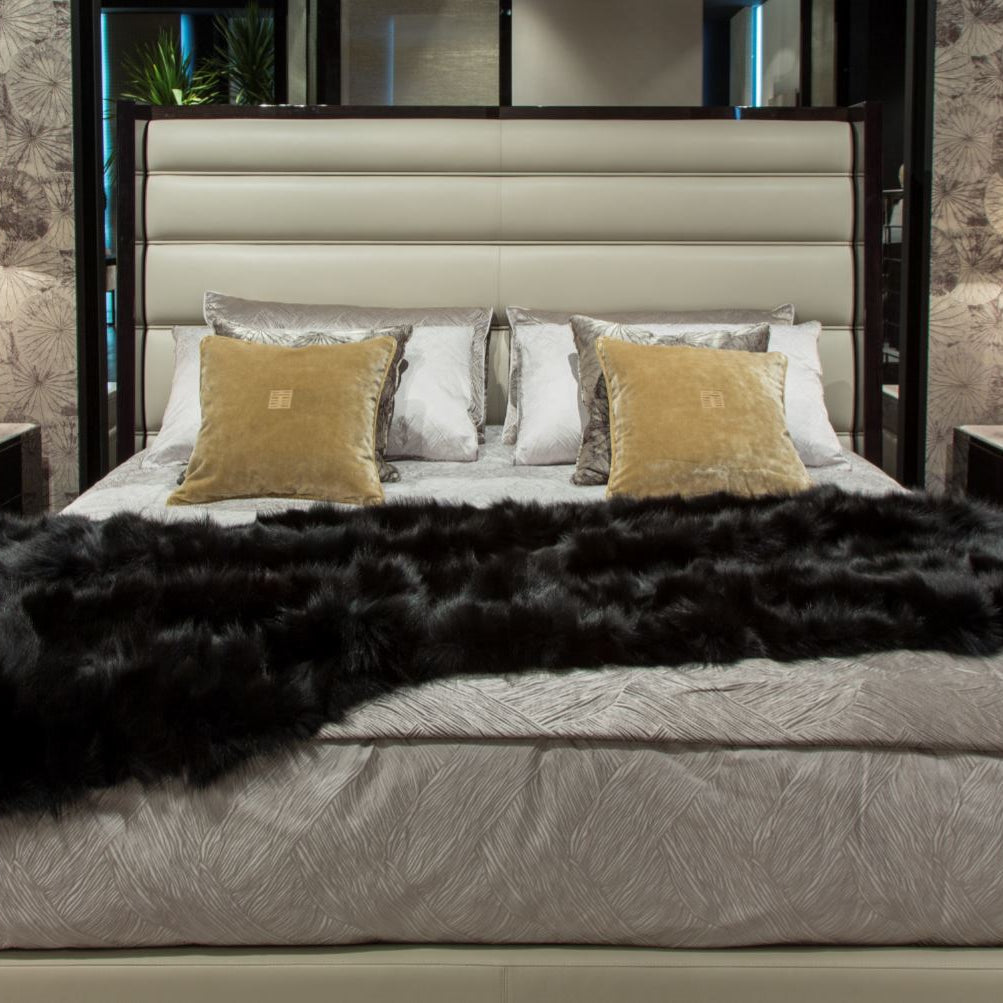 black and more bed with lamps