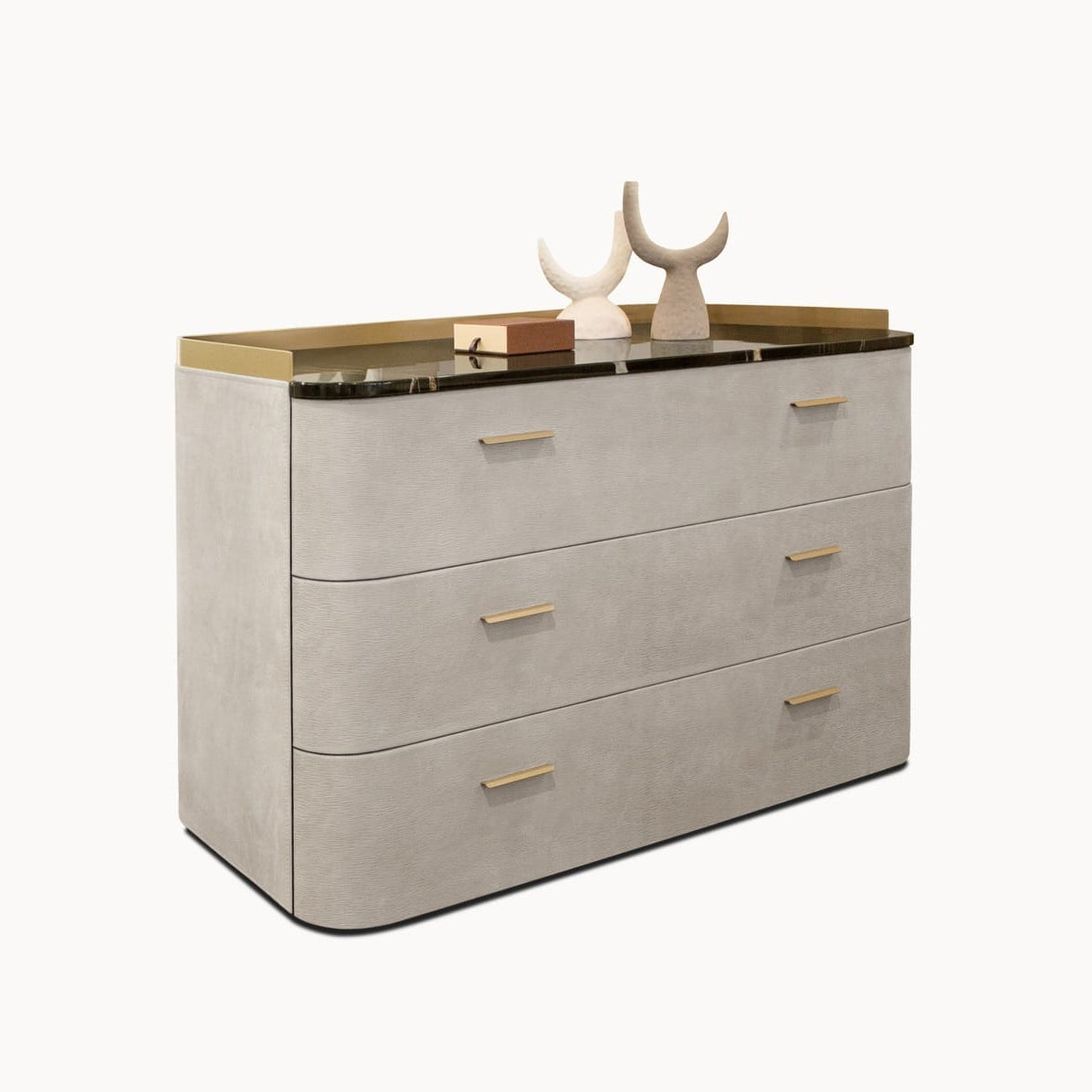 Gray dresser with gold accents on a white background