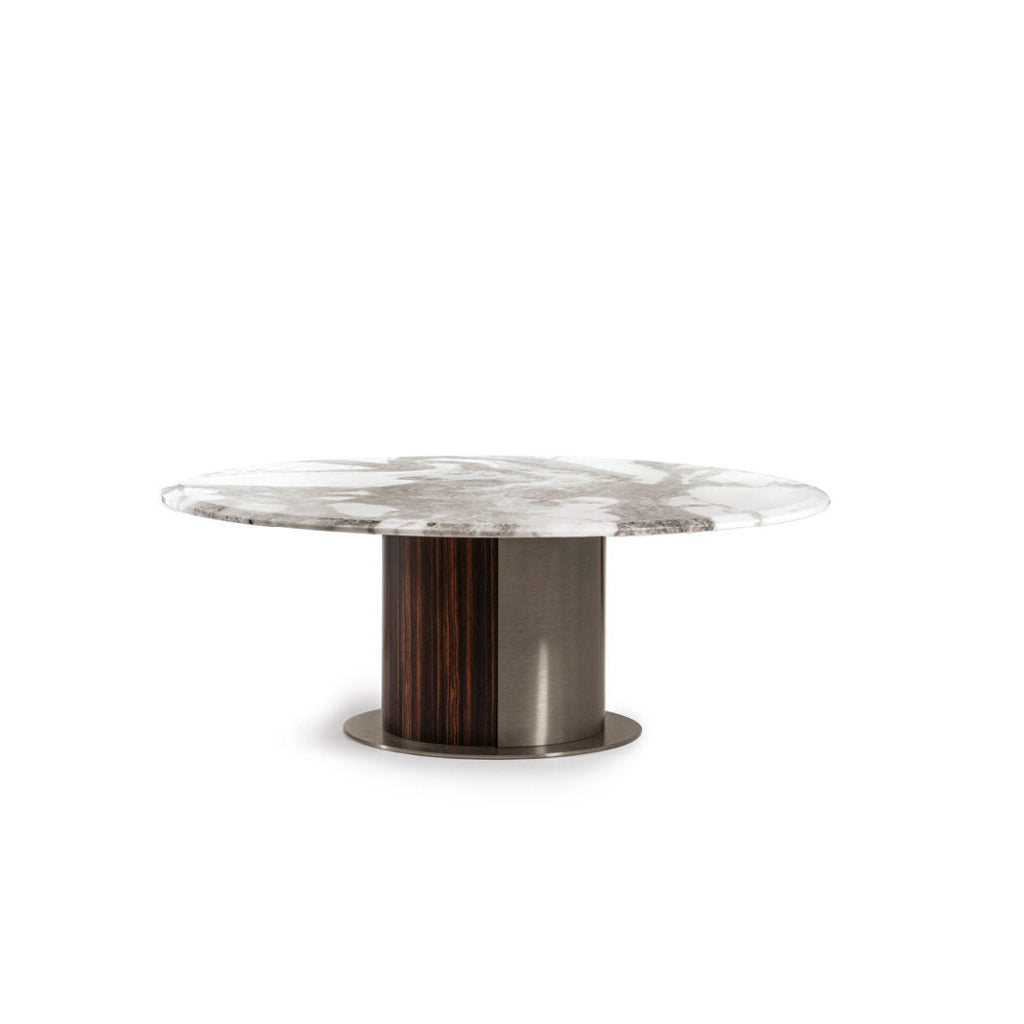 A round cocktail table with a beveled top in high gloss Namibian Oyster marble and a combination of satined Makassar Ebony veneer and stainless steel base with two lasered Giorgio Collection logos.