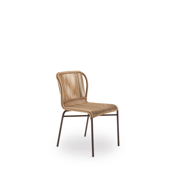 A beige dining chair with a hard backrest and seat made of wicker, featuring a smooth curved design. The chair is set against a white background.