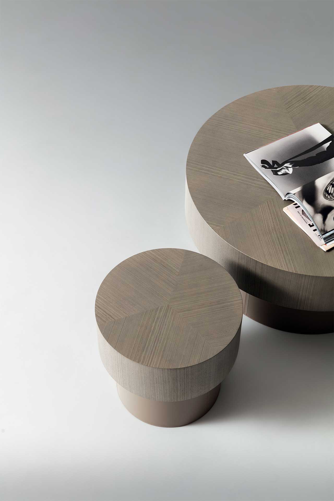 Two wooden side tables on a light gray background